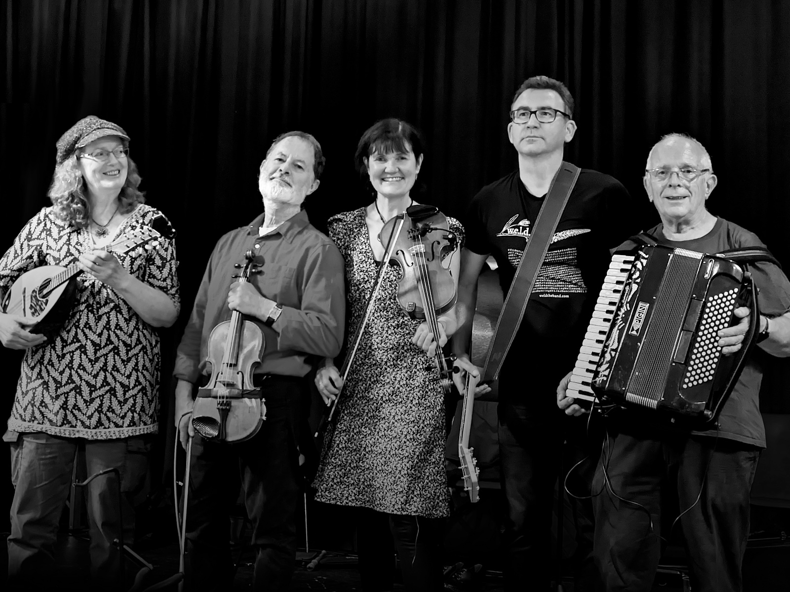 black and white phot of the band on stage